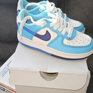 Kids Blue and White Nike Shoes
